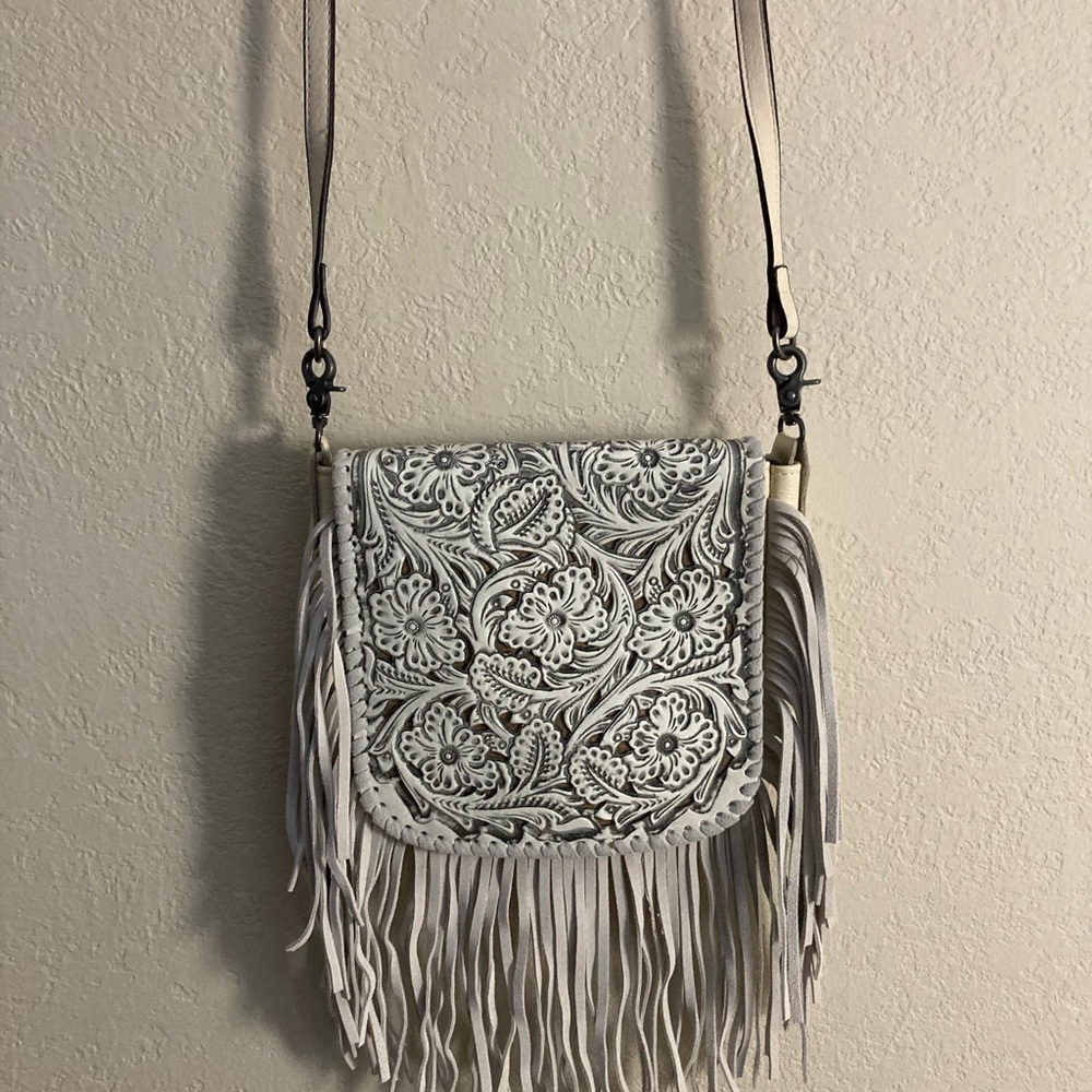 White floral tooled leather westpurse with leather fringe adjustable cross body